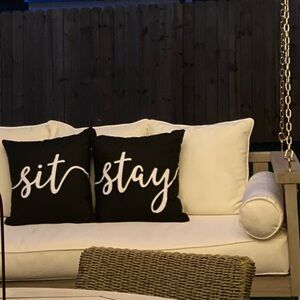 “Sit” & “Stay” black & white outdoor pillows